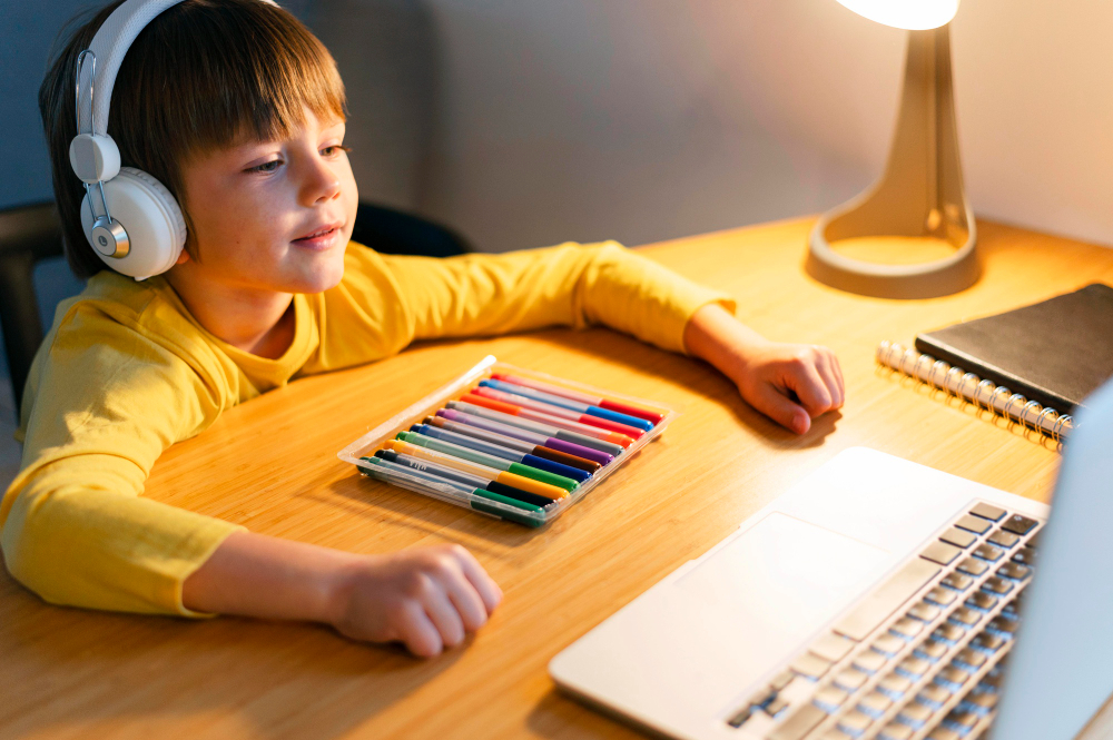 Student using colored pencils during a classroom learning activity.