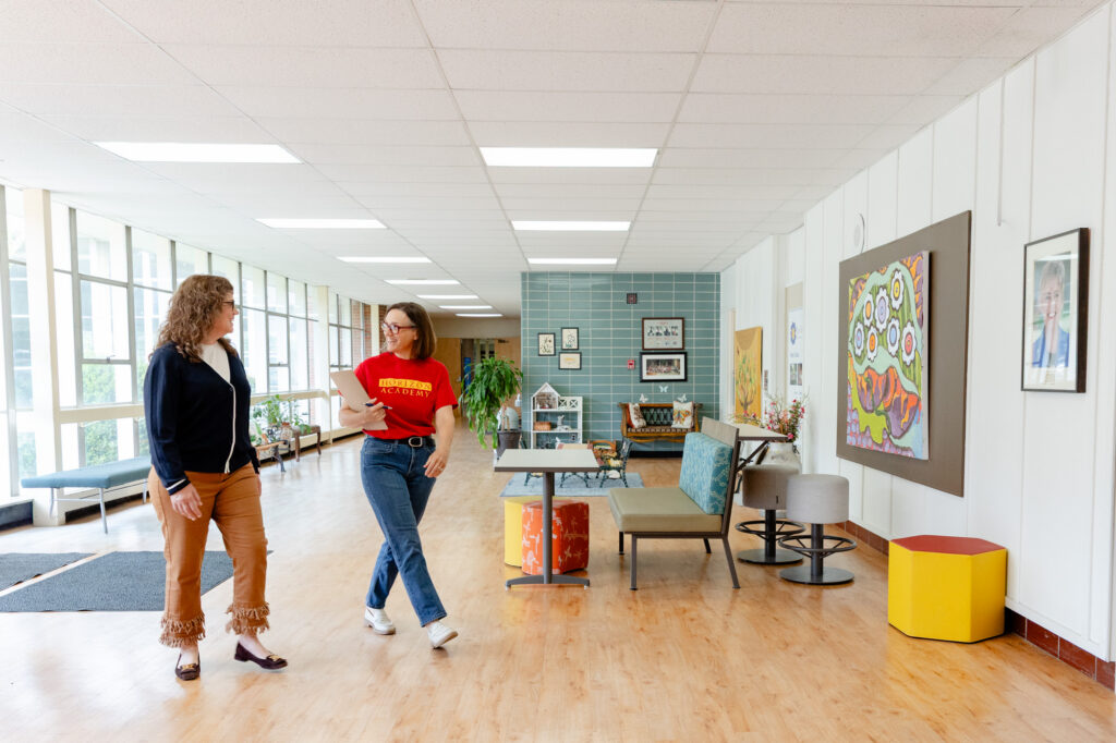 Prospective families walking through the Horizon Academy campus during an admissions tour.