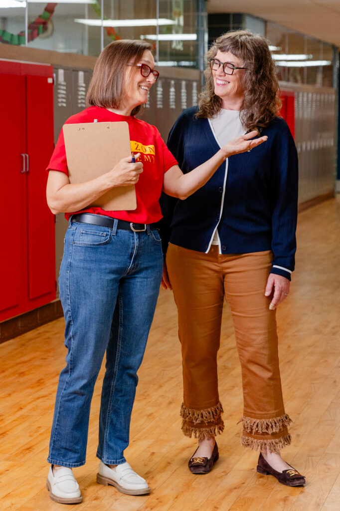 Horizon Academy staff welcoming visitors during a campus admissions tour.