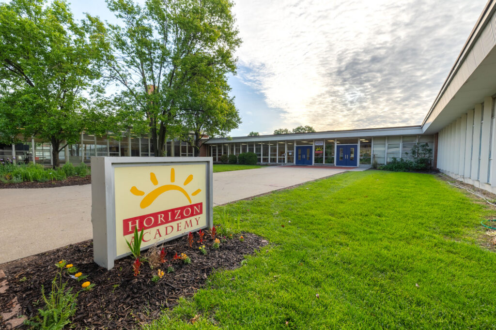 Horizon Academy campus entrance sign displayed outside the school building.