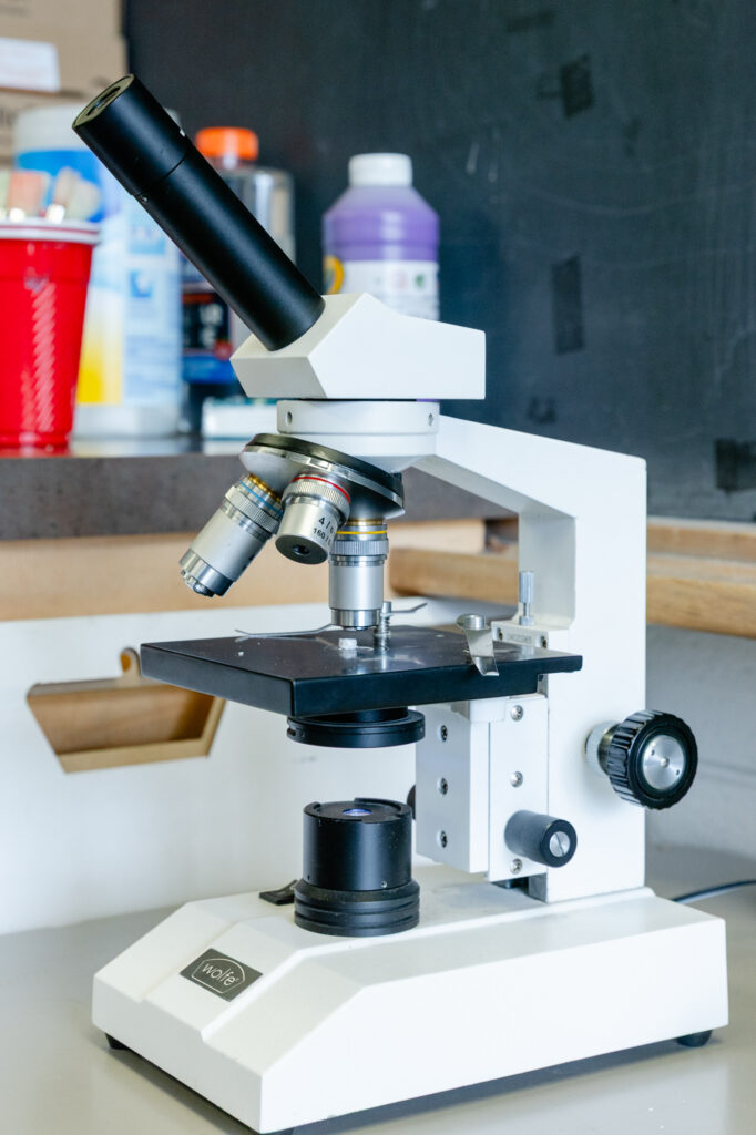 Microscope and science materials used for hands-on learning at Horizon Academy.
