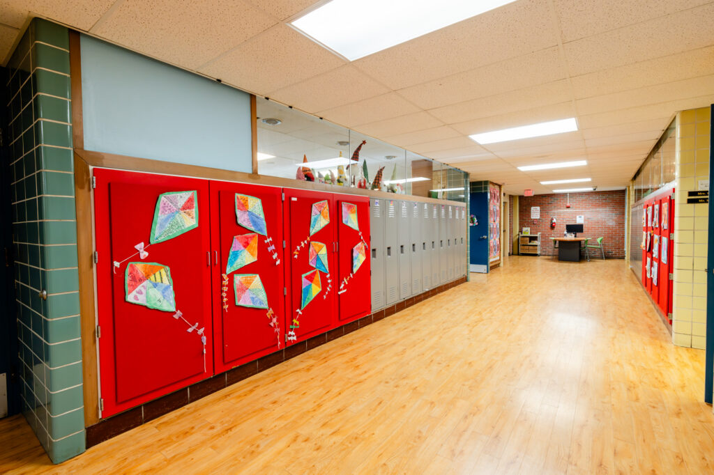 School hallway with colorful lockers at Horizon Academy.