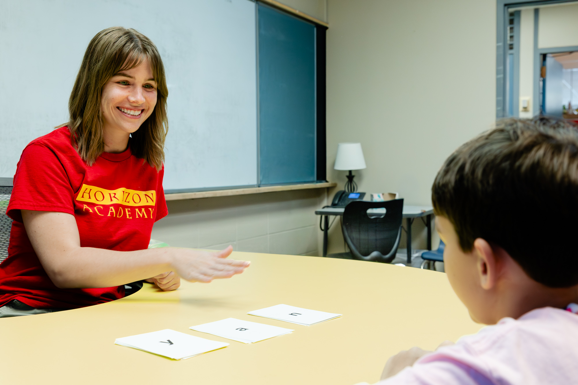 Tutor working one-on-one with a student during a personalized learning session.