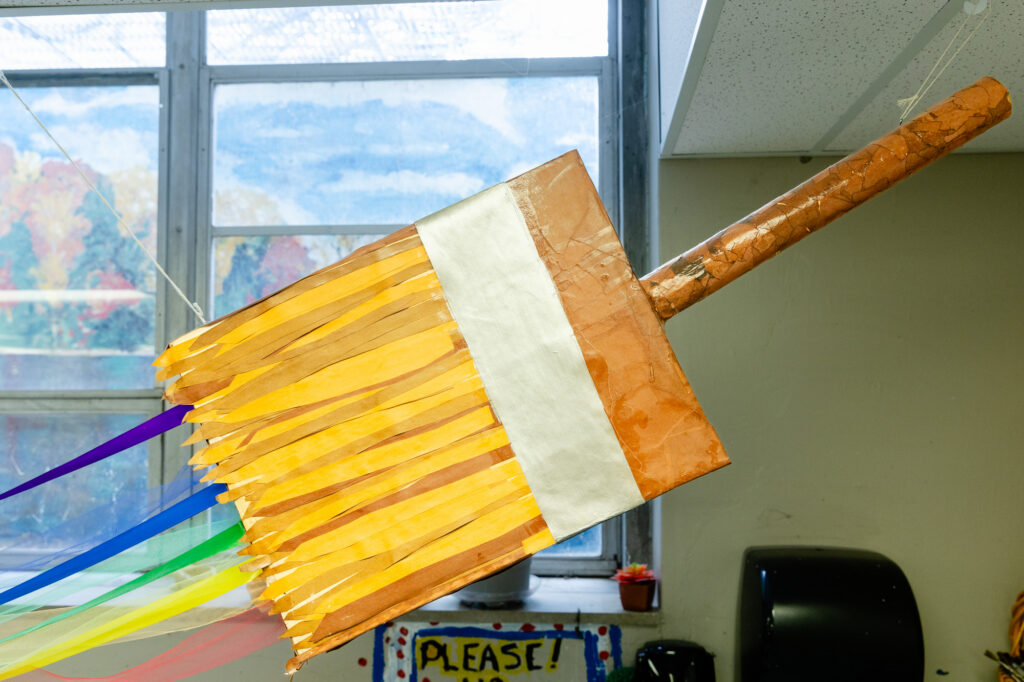 Close-up of colorful student artwork displayed in a classroom at Horizon Academy.