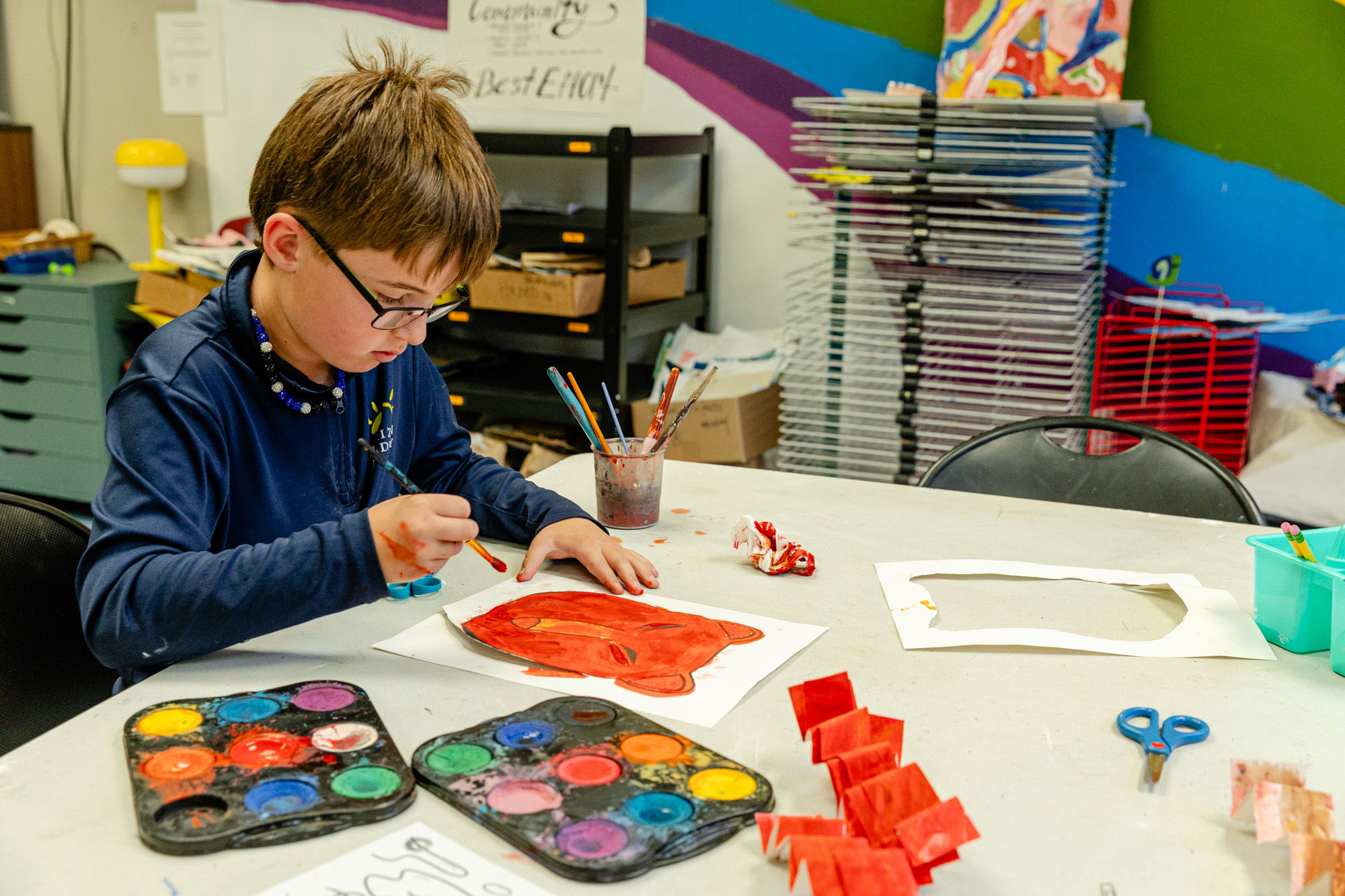 Student participating in a hands-on classroom learning activity at Horizon Academy.