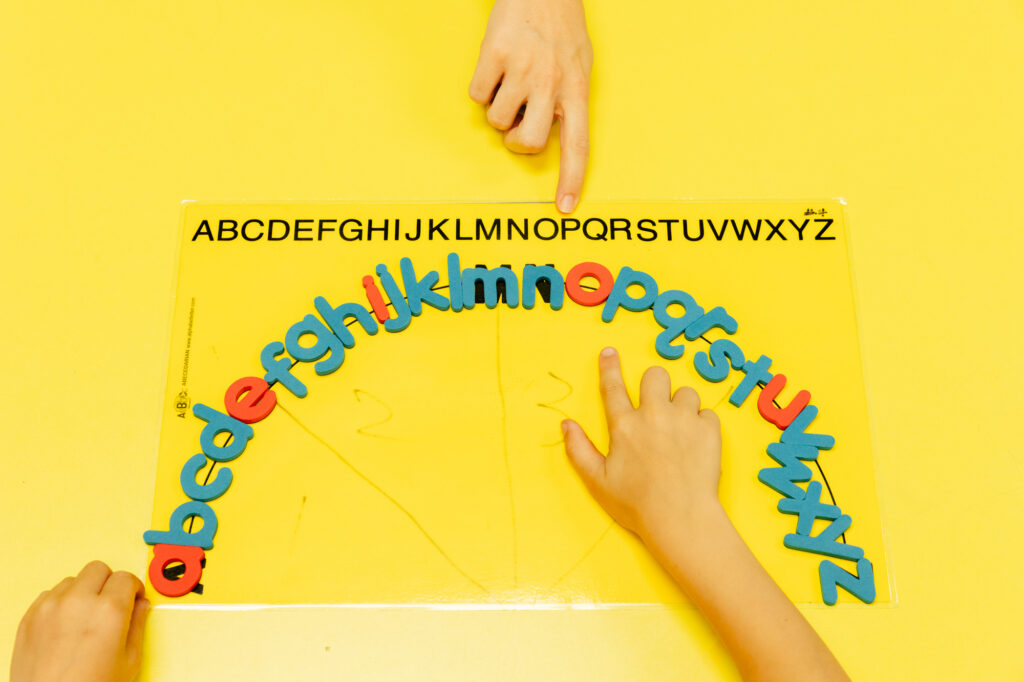 Alphabet letters arranged in a circle during a hands-on literacy activity.