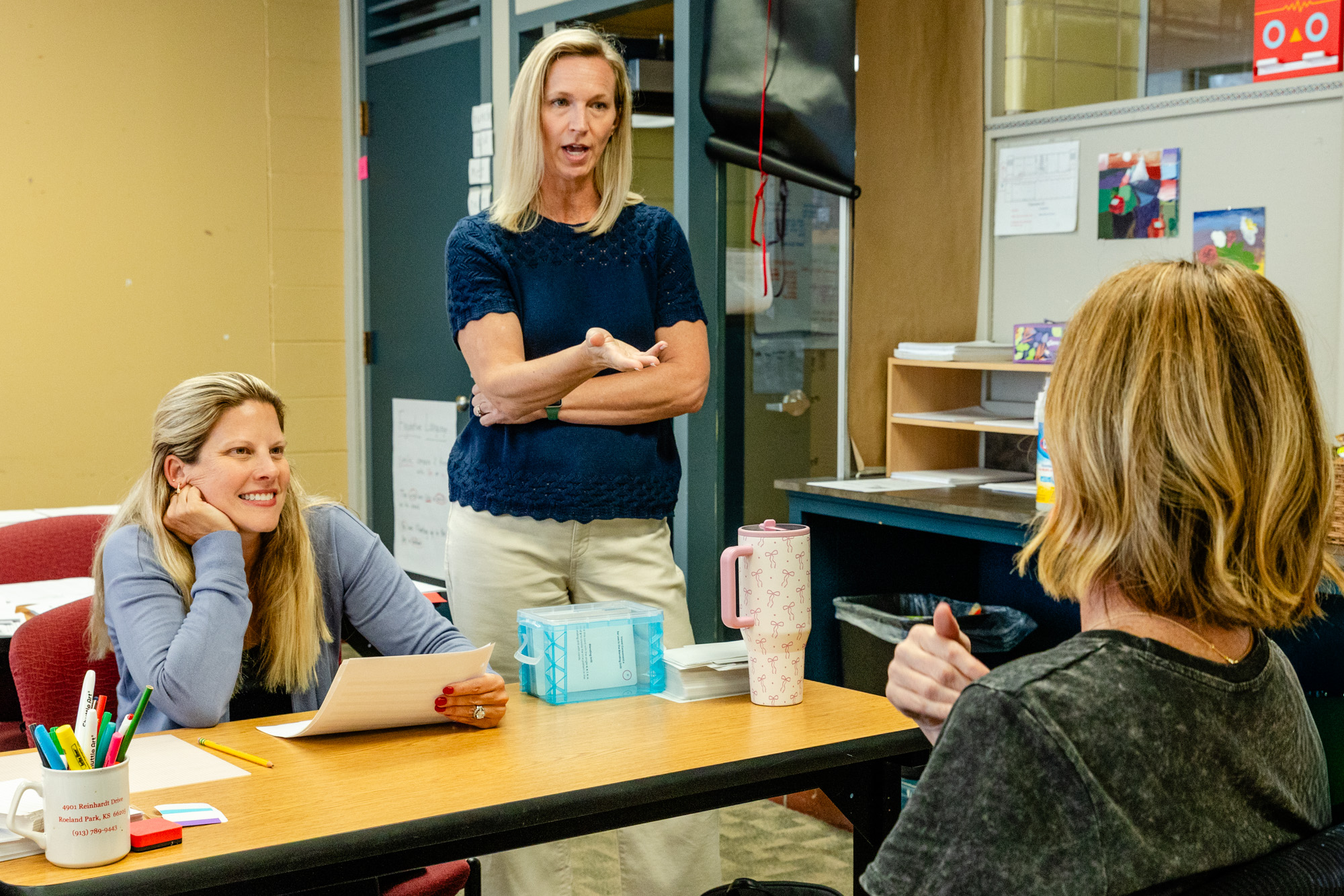 Instructor speaking to educators during a teacher training workshop at Horizon Academy.