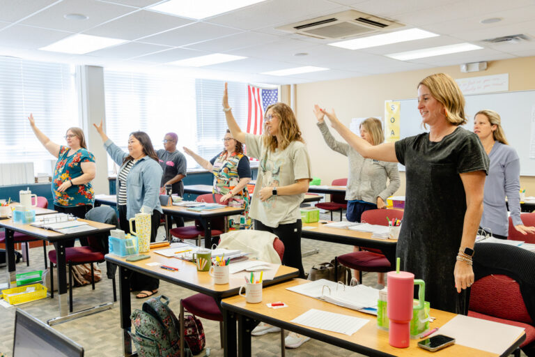 Educators participating in a teacher training workshop at Horizon Academy.